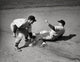 Two baseball players in action on the field poster print