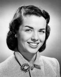 Studio portrait of a young woman smiling poster print