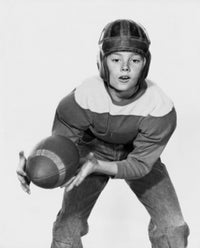 American football player catching football poster print
