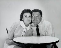 Close-up poster print of a mid adult couple looking up, emotional and intimate artwork.