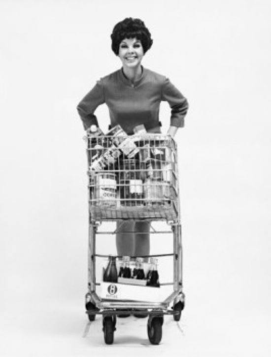 Portrait of a Young Woman Holding a Shopping Cart Poster Print