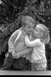 Little girl kissing boy poster print, heartwarming art