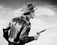 Rear view of a cowboy holding a pistol poster print.