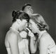 Side profile of a teenage girl pointing at another girl with a young man beside them poster print.