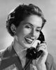 Close-up poster print of a young woman talking on the telephone.