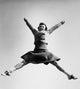 Female cheerleader jumping poster print - dynamic action shot