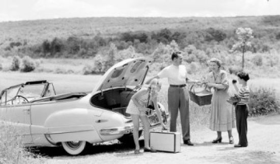 Poster print of parents and children loading luggage into a car, perfect for family-themed decor.