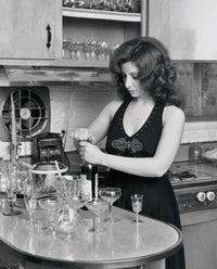 Young woman opening a wine bottle poster print, perfect for home decor.