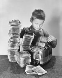 Boy Toasting Bread in a Toaster Poster Print