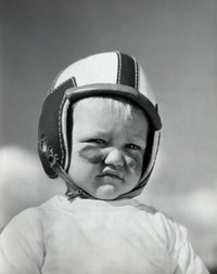Boy wearing a safety helmet poster print, vibrant and engaging design.