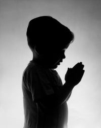 Side profile of a boy praying poster print, inspirational decor