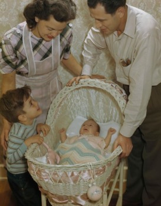 Mid adult couple with their son and daughter poster print