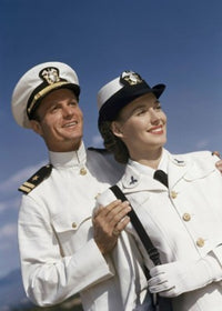 Close-up of a young couple smiling in US Naval uniforms poster print