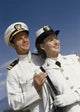 Close-up of a young couple smiling in US Naval uniforms poster print