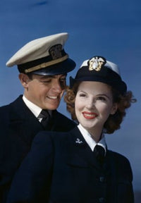 Close-up of a young couple smiling in US Naval uniforms poster print.