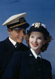 Close-up of a young couple smiling in US Naval uniforms poster print.