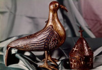 The Pigeon Gold Poster Print showcasing a beautiful golden pigeon.