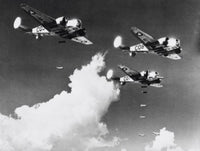 Low angle view of three aircrafts in bombing practice poster print