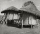 Grain storage bins in a field in Malawi poster print