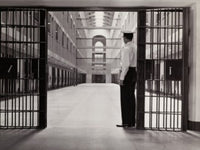 Side profile poster print of a prison guard, showcasing authority and strength.