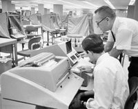 Office worker demonstrating computer interrogation device poster print