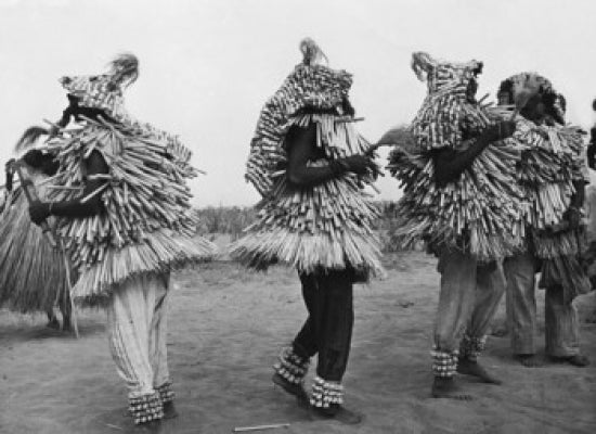 Native dancers in traditional costumes poster print showcasing cultural dance from Benin.