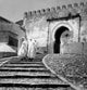 Tangier Morocco poster print featuring two women in traditional clothing on stairs.