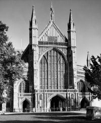 Facade of Winchester Cathedral Poster Print showcasing intricate Gothic architecture.