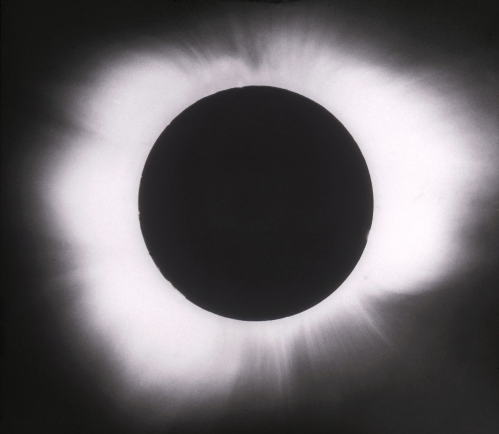 Solar Eclipse with Outer Corona Poster Print showcasing the beauty of a solar eclipse.
