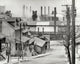 Houses and Steelmill Poster Print showcasing industrial architecture.