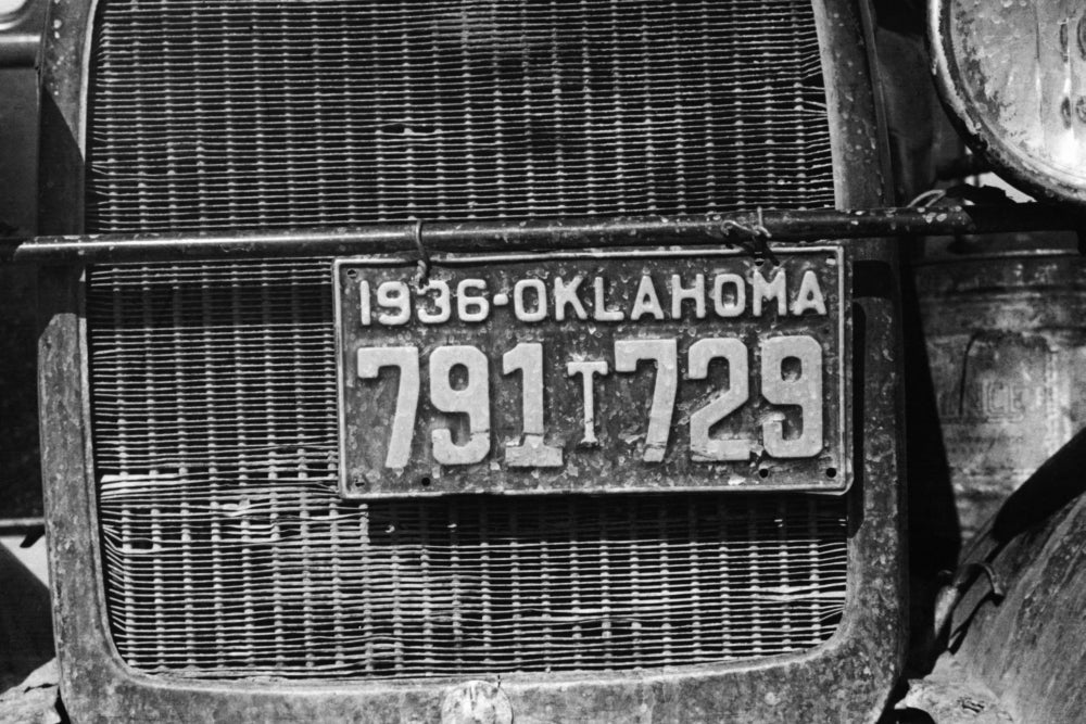 Radiator and License Plate Poster Print showcasing vintage design.