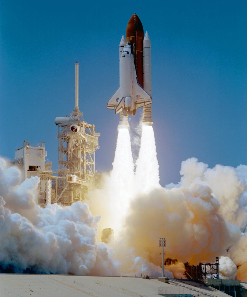 STS-121 Space Shuttle Discovery Launch Poster Print showcasing the exciting moment of the 2006 launch.