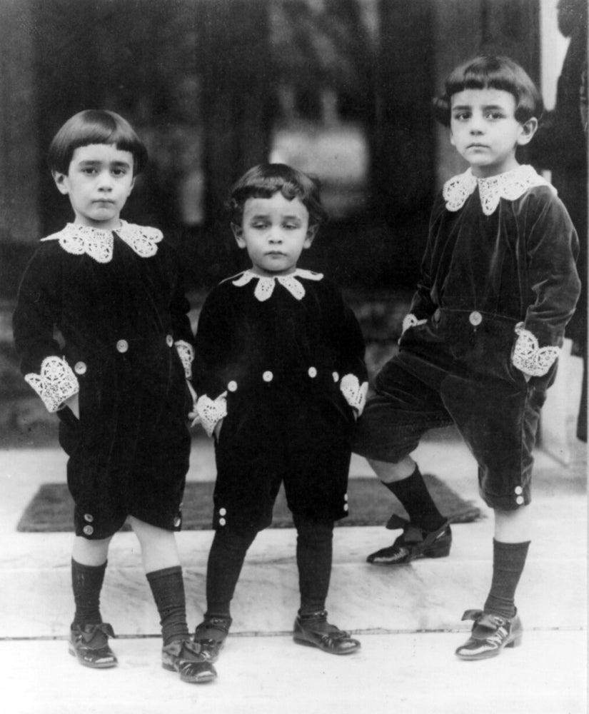 Trio Wearing Fauntleroy Suits Poster Print showcasing three boys in elegant suits.