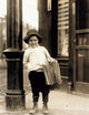 St. Louis Newsboy Poster Print by Lewis Hine, 1910, vintage photography.