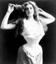 Woman Wearing Corset 1899 Poster Print showcasing historical fashion art.