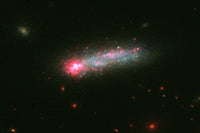 Dwarf Galaxy Kiso 5639 Poster Print showcasing a stunning cosmic scene.