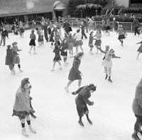 Ice Skating in Rockefeller Center, 1941 Poster Print showcasing vintage New York winter scene.