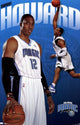 Magic - D Howard 10 Poster Print showcasing basketball action.