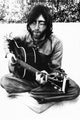 John Lennon Sitting Poster Print - 22x34 Rolled Art