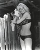 Stella Stevens smiling in floral lingerie black and white photo print.