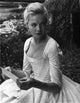 Photo print of Susannah York reading outdoors, 8 x 10 size.