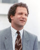 Albert Brooks portrait photo print in grey suit.