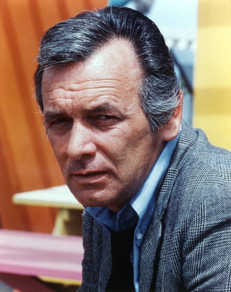 David Janssen close-up portrait photo print in black coat.