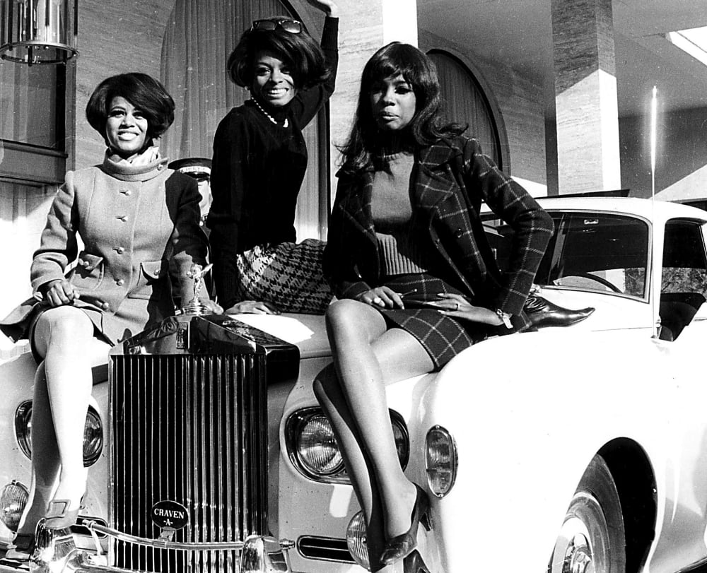 Diana Ross and The Supremes photo print on a classic car