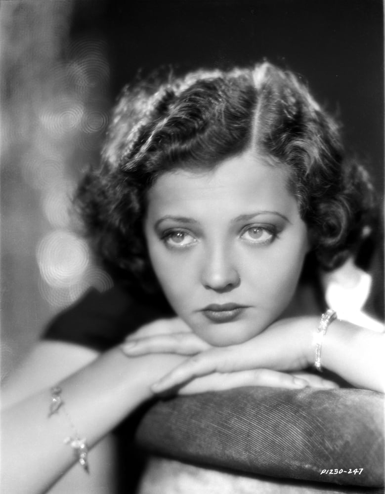 Sylvia Sidney portrait photo print leaning on hand, available in multiple sizes.
