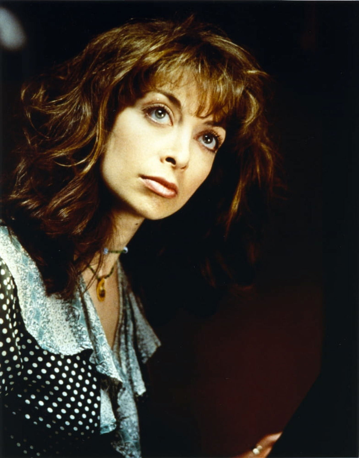 Illeana Douglas wearing a polka dot blouse photo print