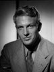 Portrait of Robert Stack photo print available in multiple sizes.