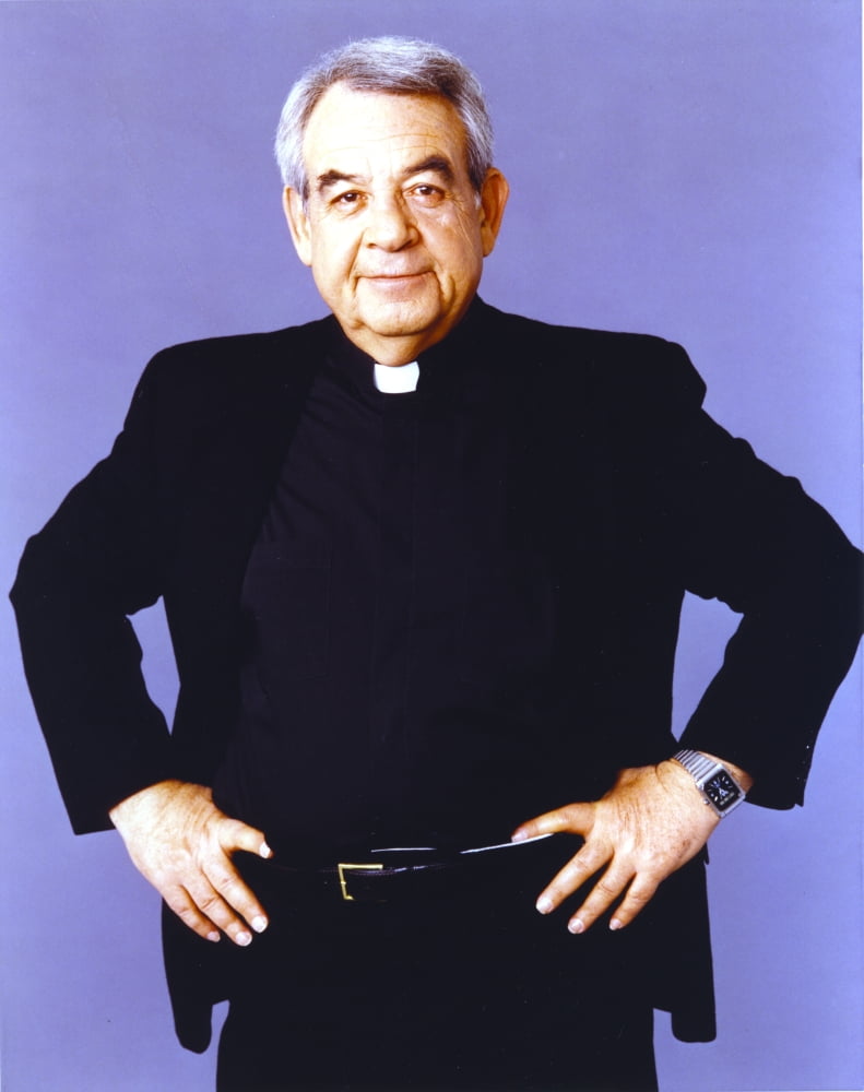 Tom Bosley posed in a black long sleeve polo photo print.