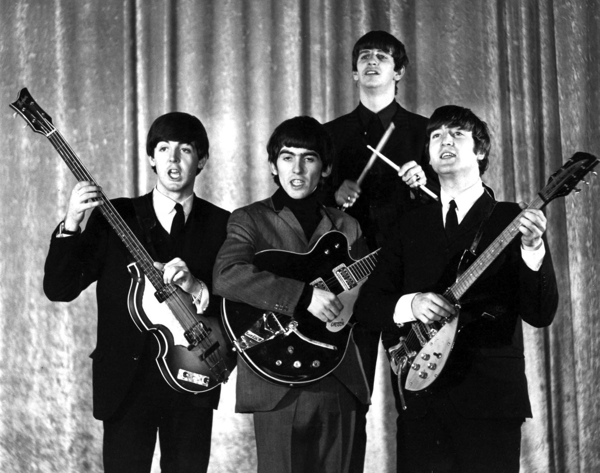 The Beatles iconic appearance on The Ed Sullivan Show photo print.