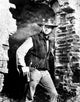 Clint Eastwood standing in cowboy attire photo print